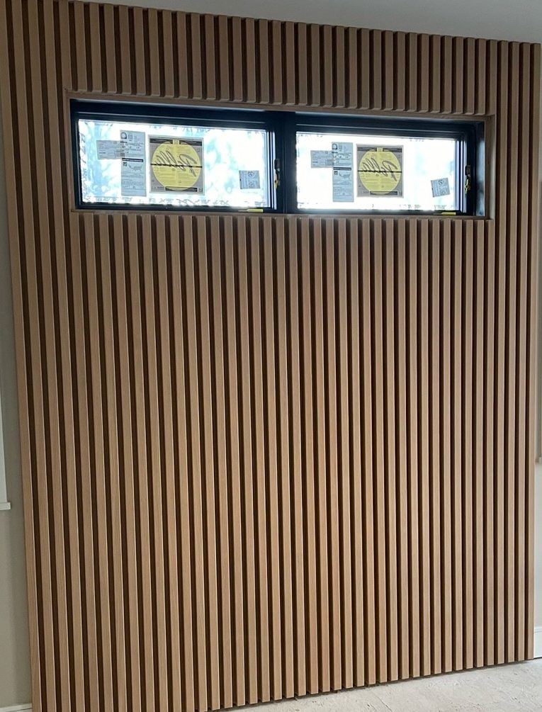 Modern vertical wood slat accent wall